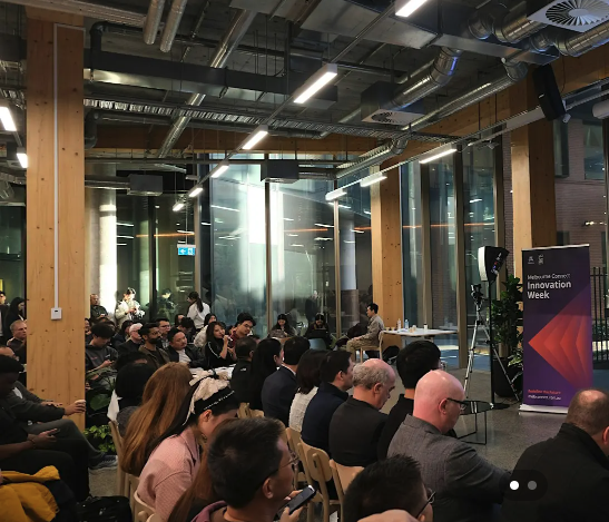 Group of people listening to a lecture