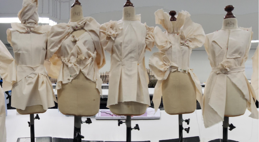 White design patterns on mannequins.